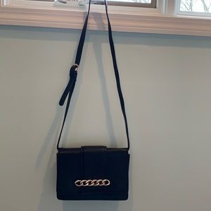 Black crossbody purse.